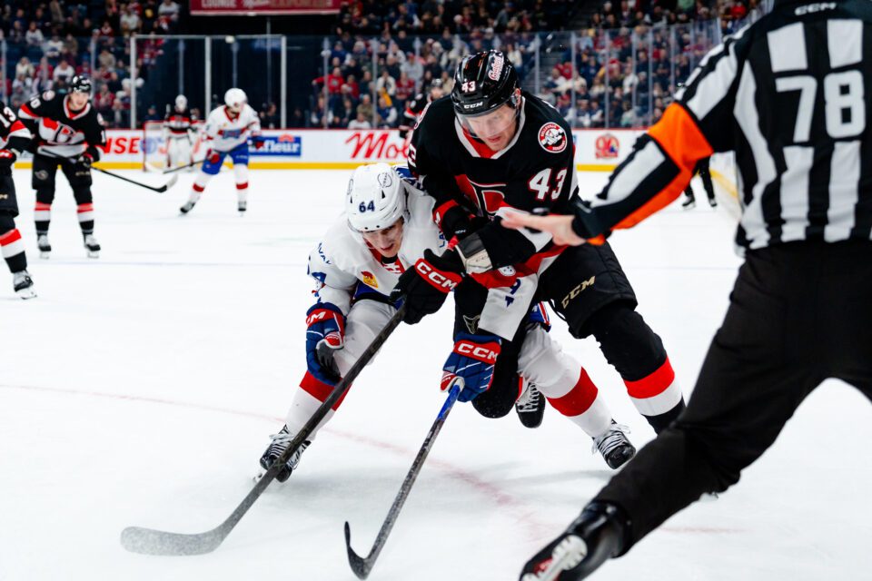 belleville player fights for puck